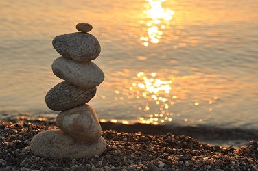 zen balance stones on beach