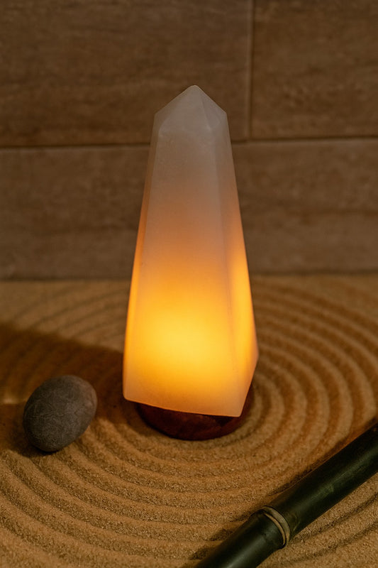 White himalayan salt lamp in zen setting